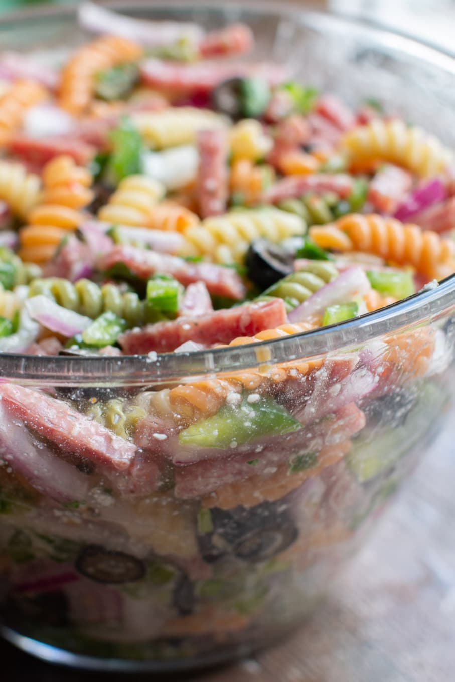 clear bowl filled with deli pasta salad