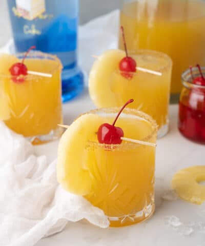 3 pineapple drinks in glasses